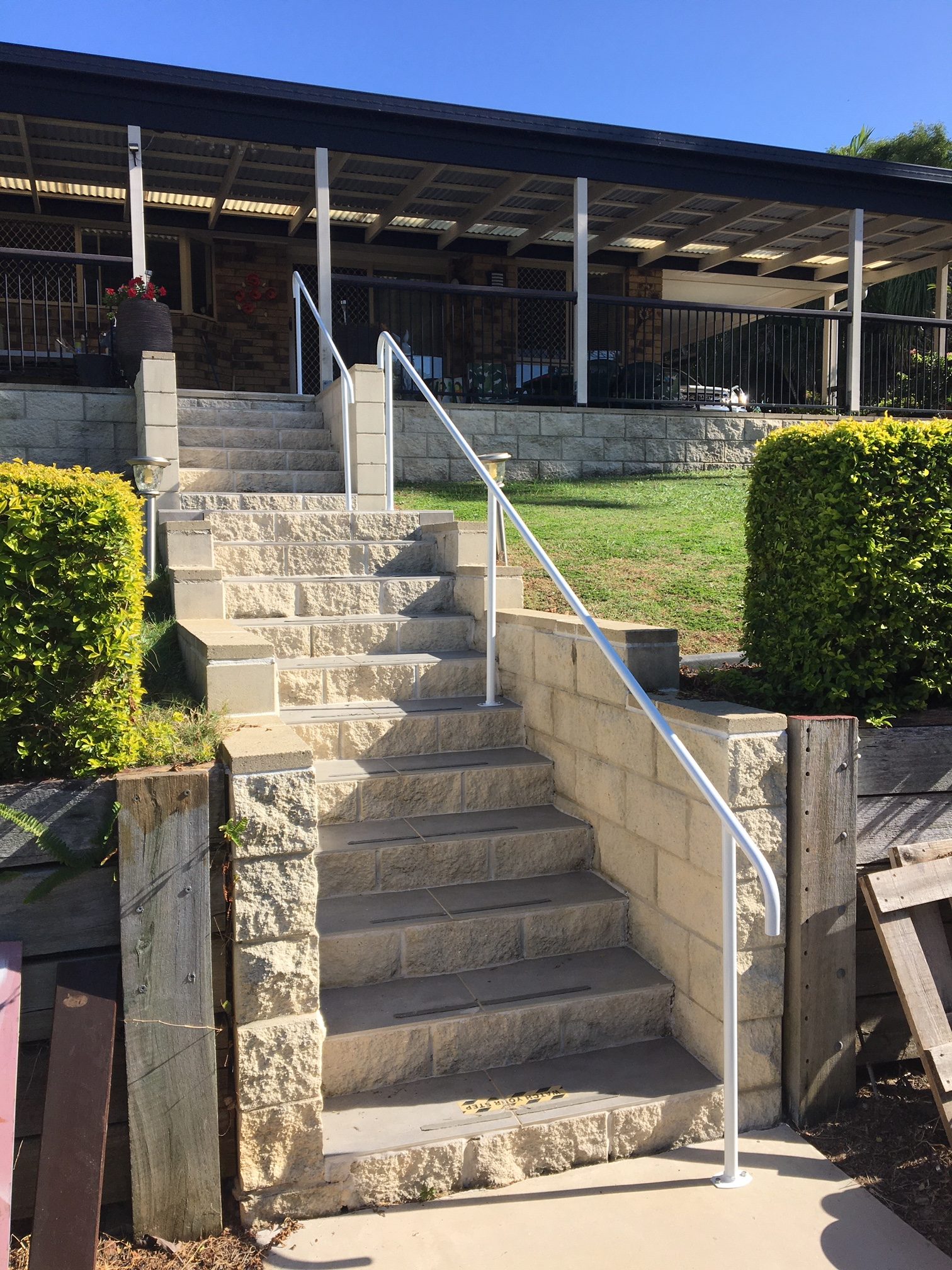 stairs to house with handrail