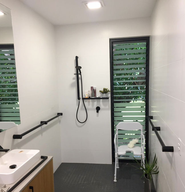 accessible bathroom with grab rail